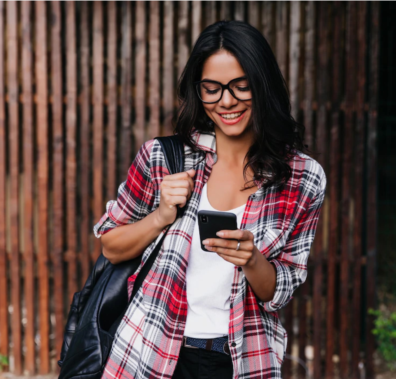 User with Mobile Phone in Hand